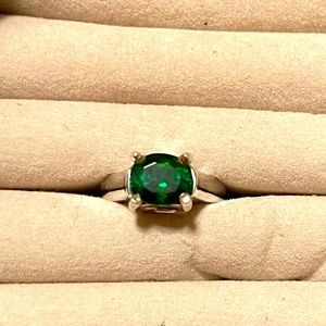 Custom designed 14K white gold ring with 2.01 Ct green tourmaline stone.